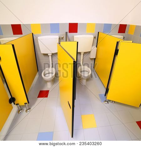 Little Toilets In The Bathroom Of A Kindergarten Without People