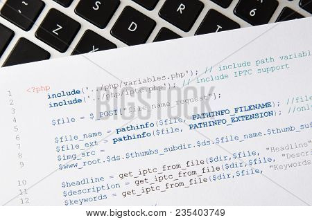 Web Developer Programming Code Printed On A Piece Of Paper