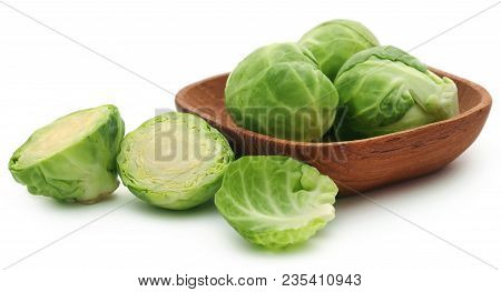 Rosenkohl Or Brussels Sprout In A Bowl Isolated Over White Background
