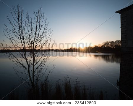 Sunrise On Saclay Reservoir Wildlife Reserve In France