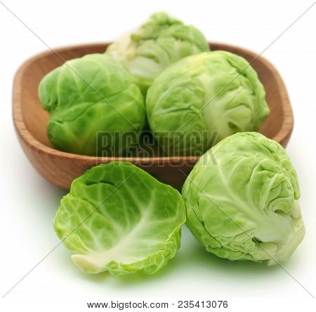 Rosenkohl Or Brussels Sprout In A Bowl Isolated Over White Background