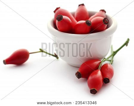Rose Hips Of Madicinal Value In Ceramic Bowl