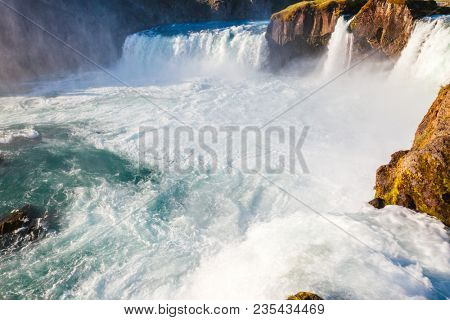 Attractive view of powerful Godafoss cascade. Location Bardardalur valley, Skjalfandafljot river, Iceland, Europe. Scenic image of beautiful nature landscape. Amazing scene. Discover beauty of earth.