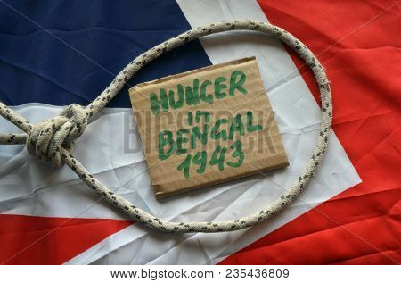British history.History of genocide. The famine in in Bengal 1943. Concept.British Flag background. April 9, 2018 in Kiev,Ukraine