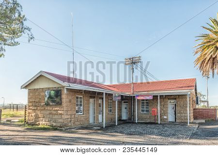 Tweespruit, South Africa - March 12, 2018: An Historic, Old, Sandstone Building In Tweespruit, A Sma
