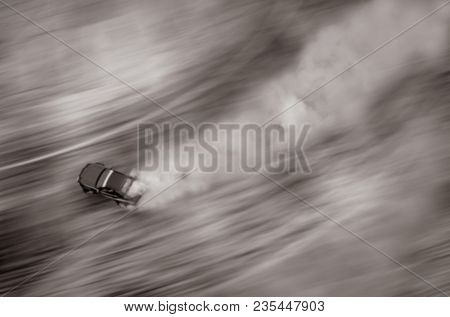 Blurred Of Image Top View Of Aerial From Drone. Professional Driver Drift Car On Asphalt Track.motor