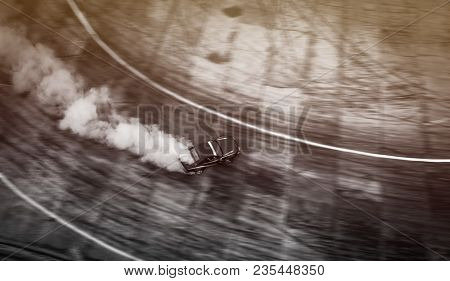 Top View Of Aerial From Drone. Professional Driver Drift Car On Asphalt Track.motor Sports Concept.