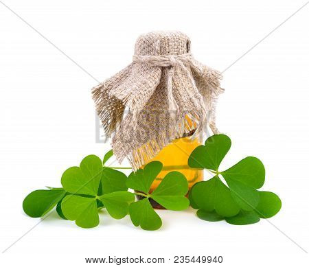 Wood -sorrel Leawes With Pharmaceutical Bottle. Isolated.