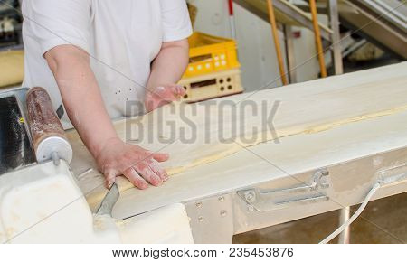Preparing And Weighing Dough In A Large Bakery.