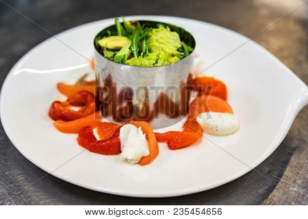 Close Up White Plate With Salad Ingredients At Cooking Workshop