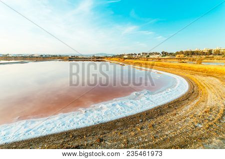 Salt Evaporation Pond View At The Flamingo Watch Reserve In Olhao, Ria Formosa Natural Park, Portuga
