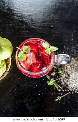 Close Up Of Popular Indian Shrabat Of Guava With Sugar And Masala In A Glass With Raw Fresh Guava On