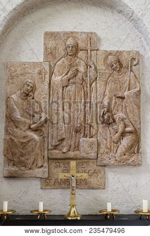 MUNSTERSCHWARZACH, GERMANY - JULY 09, 2017: Saints Anselm of Canterbury, the bishops Liudger and Ansgar, missionary in Scandinavia, altar in Munsterschwarzach Abbey, Benedictine monastery, Germany.