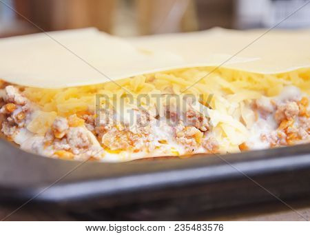 Delicious Lasagna With Meat Covered With Cheese, On A Baking Sheet