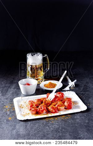 A Fresh And Tasty Curry Bockwurst With Beer