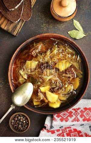 Russian Vegetarian Sour Cabbage Soupe (shchi) With Dried Mushrooms.top View .