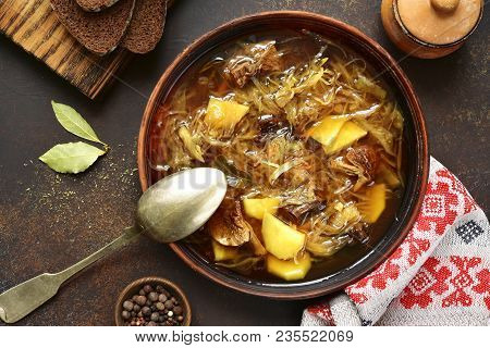Russian Vegetarian Sour Cabbage Soupe (shchi) With Dried Mushrooms.top View .