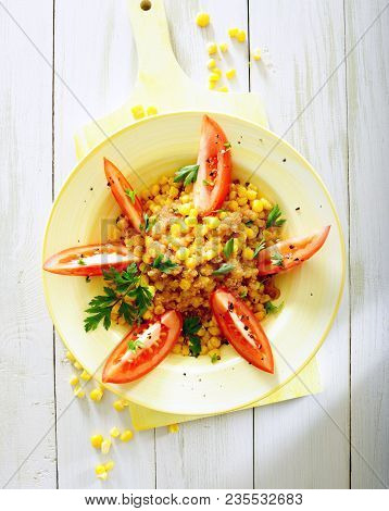 Pan Fried Crispy Sweet Corn Salad With Tomato.