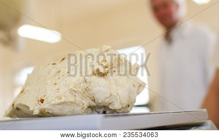 Preparing And Weighing Dough In A Large Bakery.