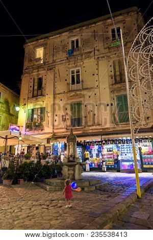 Tropea, Italy - September 06, 2016: People Visit Illuminated Tropea Old Town In Summer Night