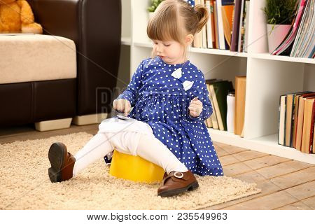 Cute Little Girl Sit On Her Chamber Pot Do Caca Playing With Cellphone Portrait