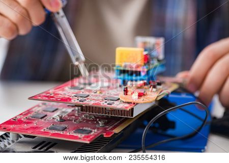 Computer hardware repair and fixing concept by experienced techn