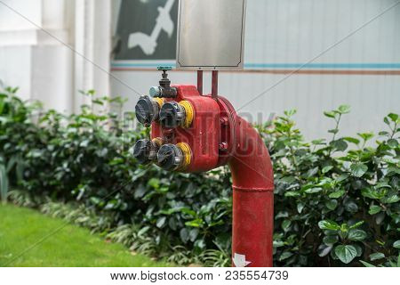Fire Water Hydrant Outside Of Apartment. Outdoor Fire Equipment