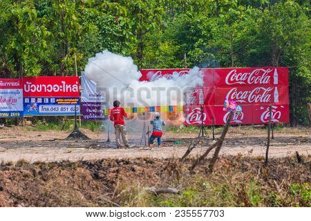 Kalasin, Thailand - May 22, 2016: People Igniting Dynamite Of Ancient Style Rocket To Prepare Launch