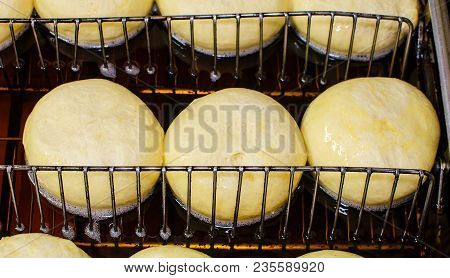Preparation Of Donuts. Roasting In Boiling Oil. Cookng, Fried.