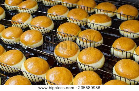 Preparation Of Donuts. Roasting In Boiling Oil. Cookng, Fried.