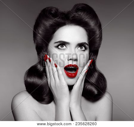 Red Lips And Manicured Nails. Surprised Pin Up Girl Holds Cheeks By Hand. Comic Woman With Curls Ret