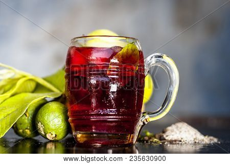Close Up Of Popular Indian Shrabat Of Guava With Sugar And Masala In A Glass With Raw Fresh Guava On