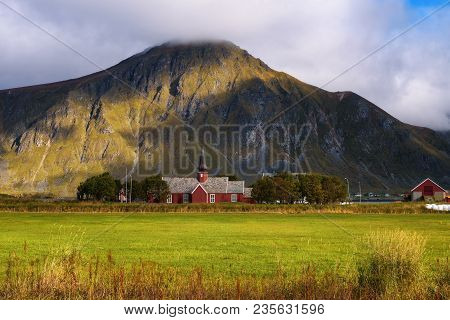 Flakstad Church On Lofoten Islands In Norway. This Red, Wooden Parish Church Was Built In 1780