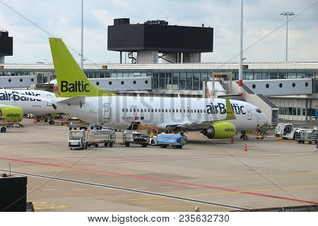 Amsterdam, Netherlands - July 11, 2017: Air Baltic Boeing 737 At Schiphol Airport In Amsterdam. Schi