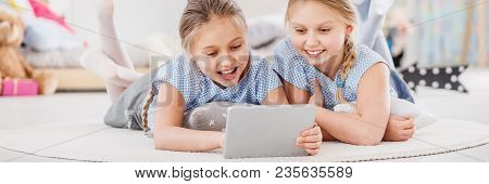 Twin Girls Watching Cartoons