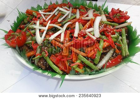 Spicy Chicken Dish With Tomatoes, Carrots, Onions And Lots Of Red Hot Chilli