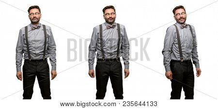 Middle age man, with beard and bow tie making funny face fooling