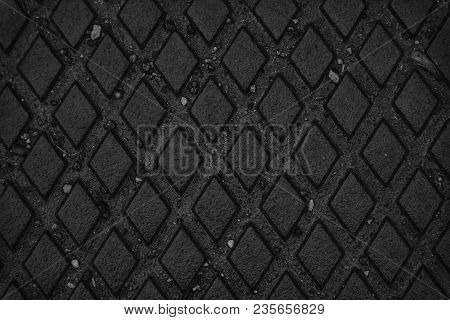 Monochrome Wet Iron Background, Rusty Texture, Cracked Surface.