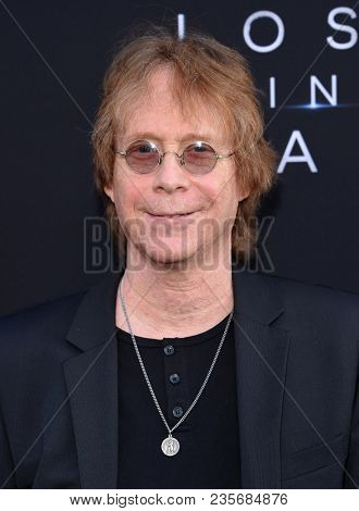 LOS ANGELES - APR 09:  Bill Mumy arrives to the premiere of Netflix's 