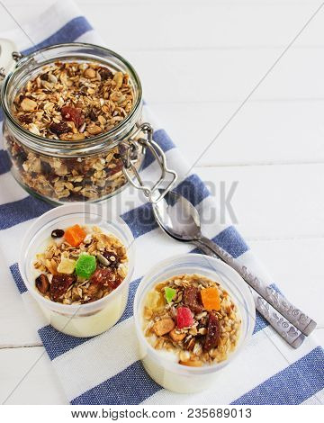 Homemade Granola Dried Fruits Oatflakes Wooden Table.