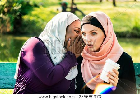 Islamic women wispering