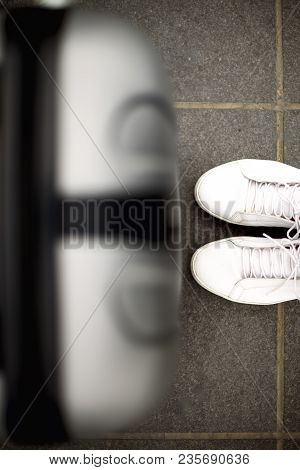 Aerial Top View With Copy Space. White Sneakers And Travel Suitcase. Travel And Vacation Concept.
