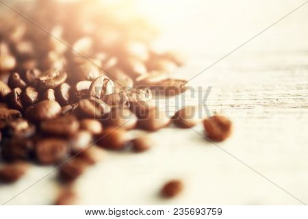 Coffee Beans On Light Wooden Background With Copyspace For Text. Coffee Background, Food Frame, Text