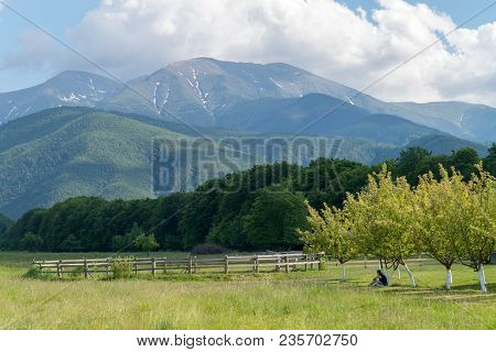 A Picturesque View To A Mountain Area With Some Greeness.