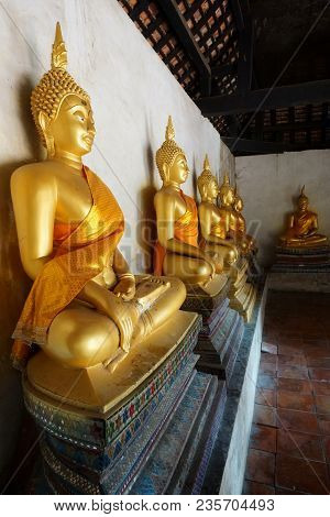 Travel Thailand -  Gloden Buddha Statue In Wat Phutthaisawan On Blue Sky And Cloud Background, Ayutt