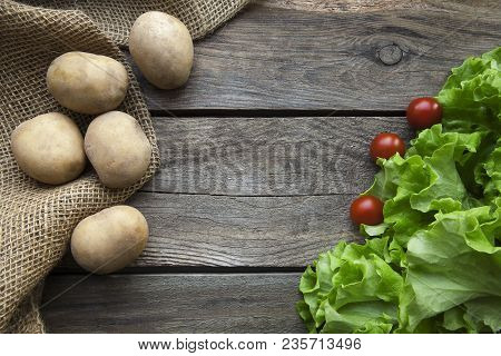 Fresh Garden Herbs On Wooden Table Board. Top View With Copy Space