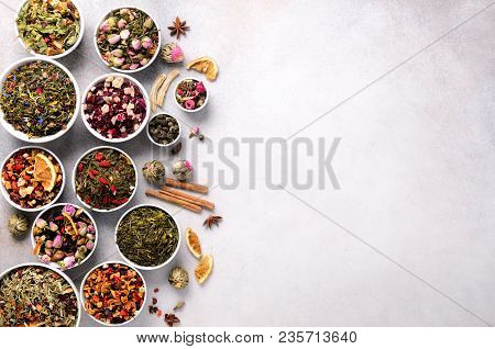 Assortment Of Dry Tea In White Bowls. Tea Types Backgound: Green, Black, Floral, Herbal, Mint, Melis