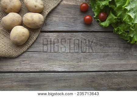 Fresh Garden Herbs On Wooden Table Board. Top View With Copy Space