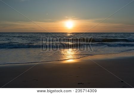 Beautiful And Colorful Sunset Sky Over The North Sea, Petten, Holland