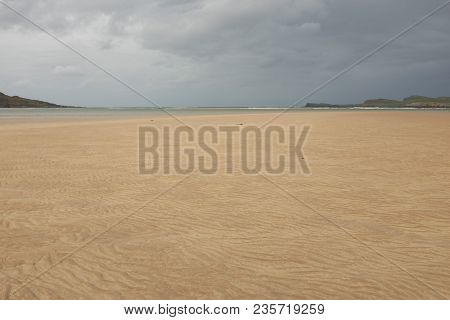 Beautiful Clean Sand Leads To The Sea At The Mouth Of The Kyle Of Durness, Scotland.